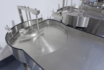 фото Линия упаковки порошковых продуктов в пластиковую банку FDX-50 от магазина Метасила